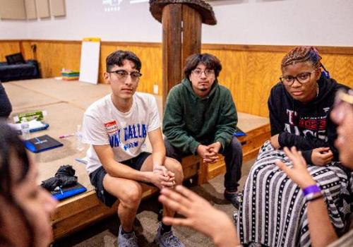 Rolando Castillo (left) Interacts with Classmates at a Leadership Retreat Known as "IGNITE."