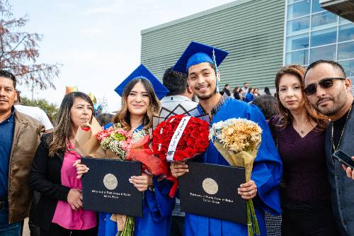 graduates and their families celebrate