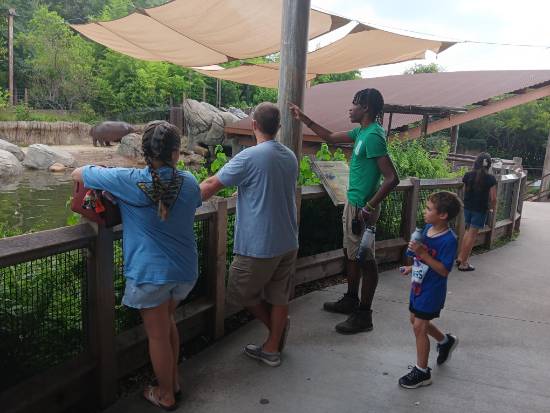 Dalon Moore Educating Visitors About an Exhibit at the Dallas Zoo