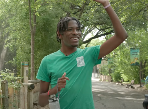 Dalon Moore Waves to Co-Workers and Guests at the Dallas Zoo