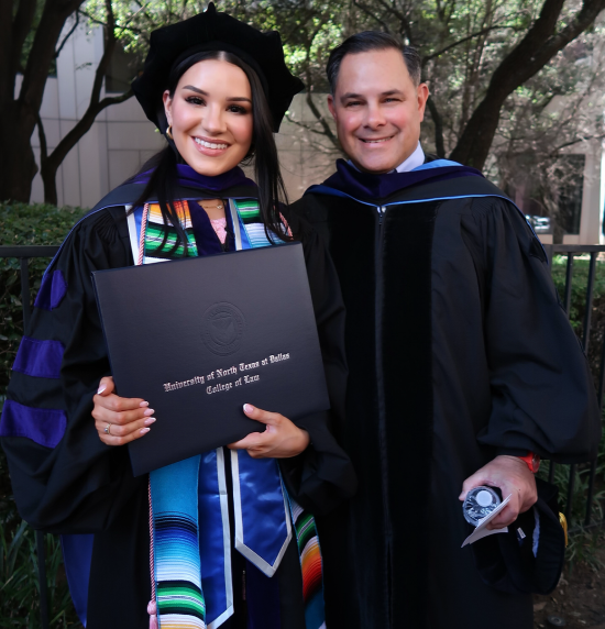 Zoe Kiraly Holds Her Law School Diploma Alongside Her Father John Following the UNT Dallas College of Law Commencement on May 18, 2024