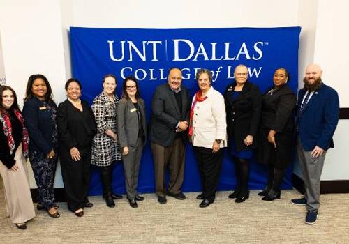 Martin Luther King III with College of Law faculty and staff including Prof. Cheryl Wattley (to King's left) and Dean Felicia Epps (to Wattley's left)