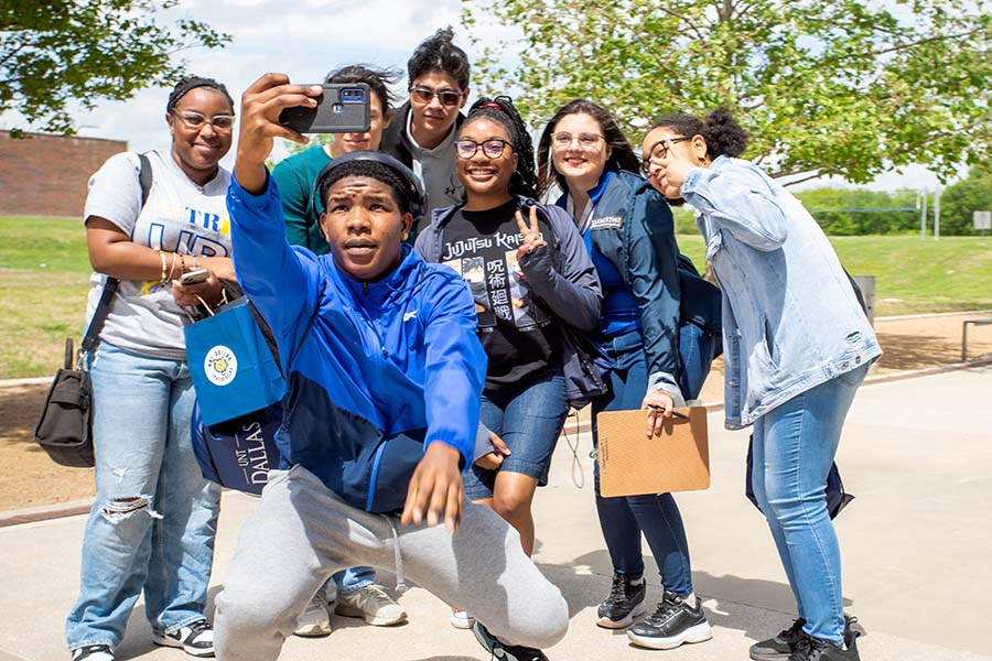 student outdoor group selfie