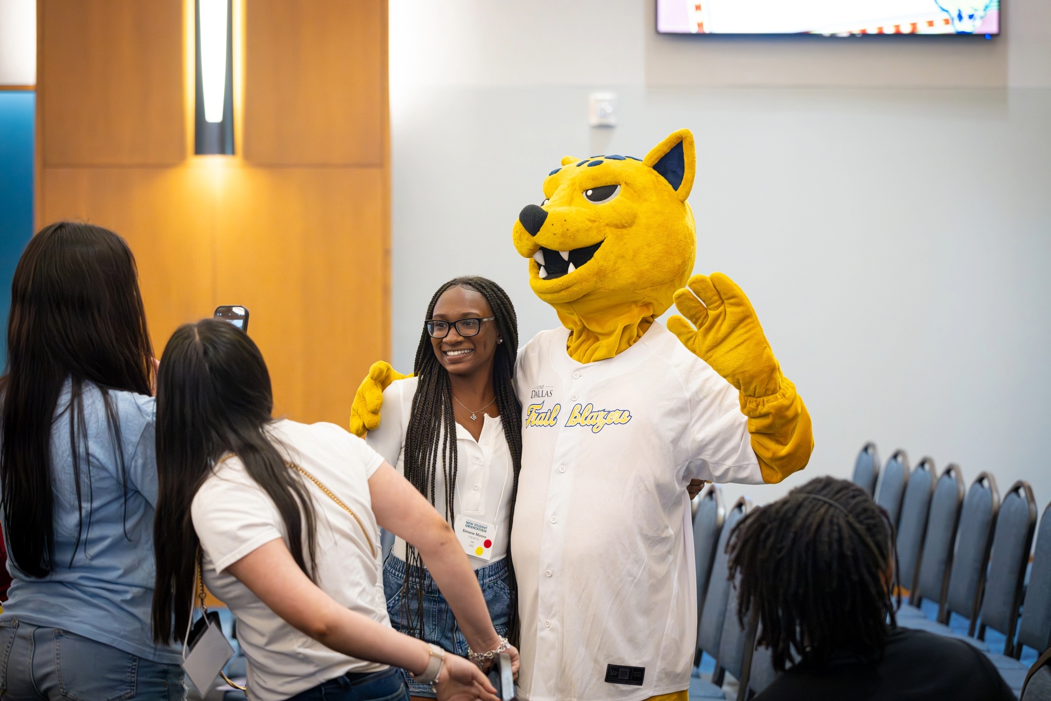 Jax and Student Student taking a picture with Jax