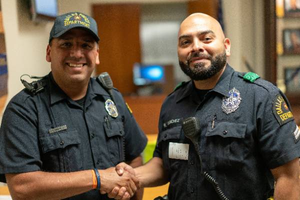 officers shaking hands